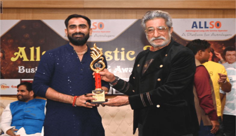 Kamlesh Pandya receiving an award